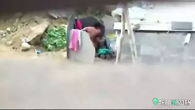 Neighbor on a hidden camera caught aunt taking a bath on the outdoor naked