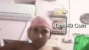 Naked Desi wears a pink towel on head and masturbates pussy