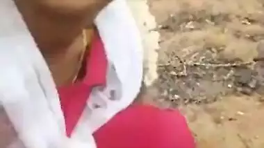 Pretty Desi harlot comes to the field to show her hairy XXX twat