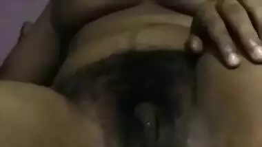 Dick-hungry Indian girl dildoing pussy with banana