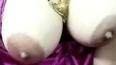 Indian female comes out with her XXX jugs hidden under a purple dress