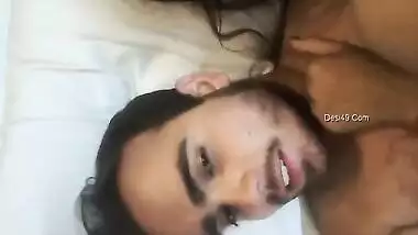 Indian chick dramatically kisses her partner in bed in soft porn video