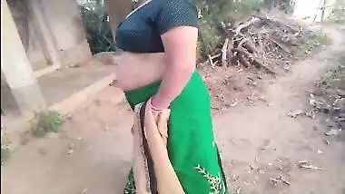 Curvy Desi Bhabhi in green XXX sari fucked under the tree by lover