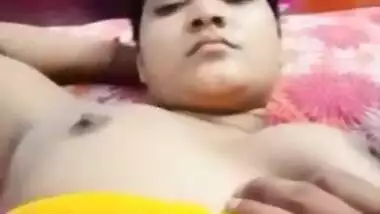 Desi fatty poses in XXX clip with young man who plays with her tits