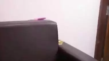 Indian MILF covers her saggy tits with pink bra in quick porn clip