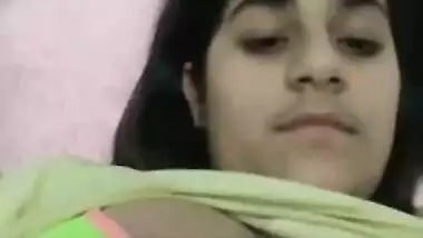 Indian girl pulls T-shirt up to expose her XXX titties and nipples