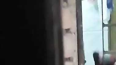 Desi girl is in bathroom and doesn't know that XXX perv films her