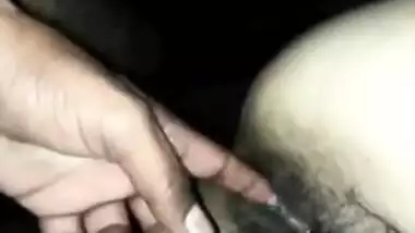 Desi girl has XXX tool of man behind the camera in her hairy pussy