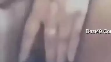 Desi girl entertains herself behind close door and online fans as well