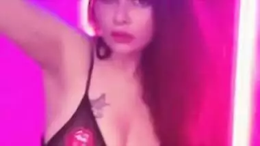 Enticing young woman reveals private parts posing in XXX lingerie