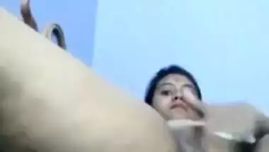 Desi exposes XXX pussy and masturbates it shoving fingers inside sex hole