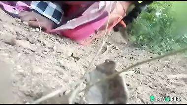 Outdoor Desi mms clip of Indian gal caught drilled by lover on land