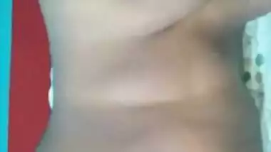 Dude plays with big XXX tits of his naked Desi wife for home video