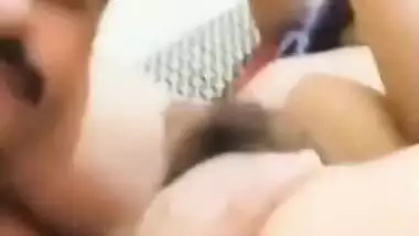 Desi charmer practices oral XXX sex with hairy pussy lover in MMS clip